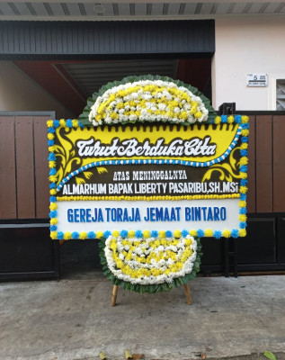Papan Bunga Duka di Nusaherang